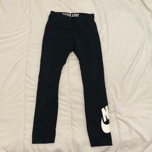 Black Nike cropped tights with white logo